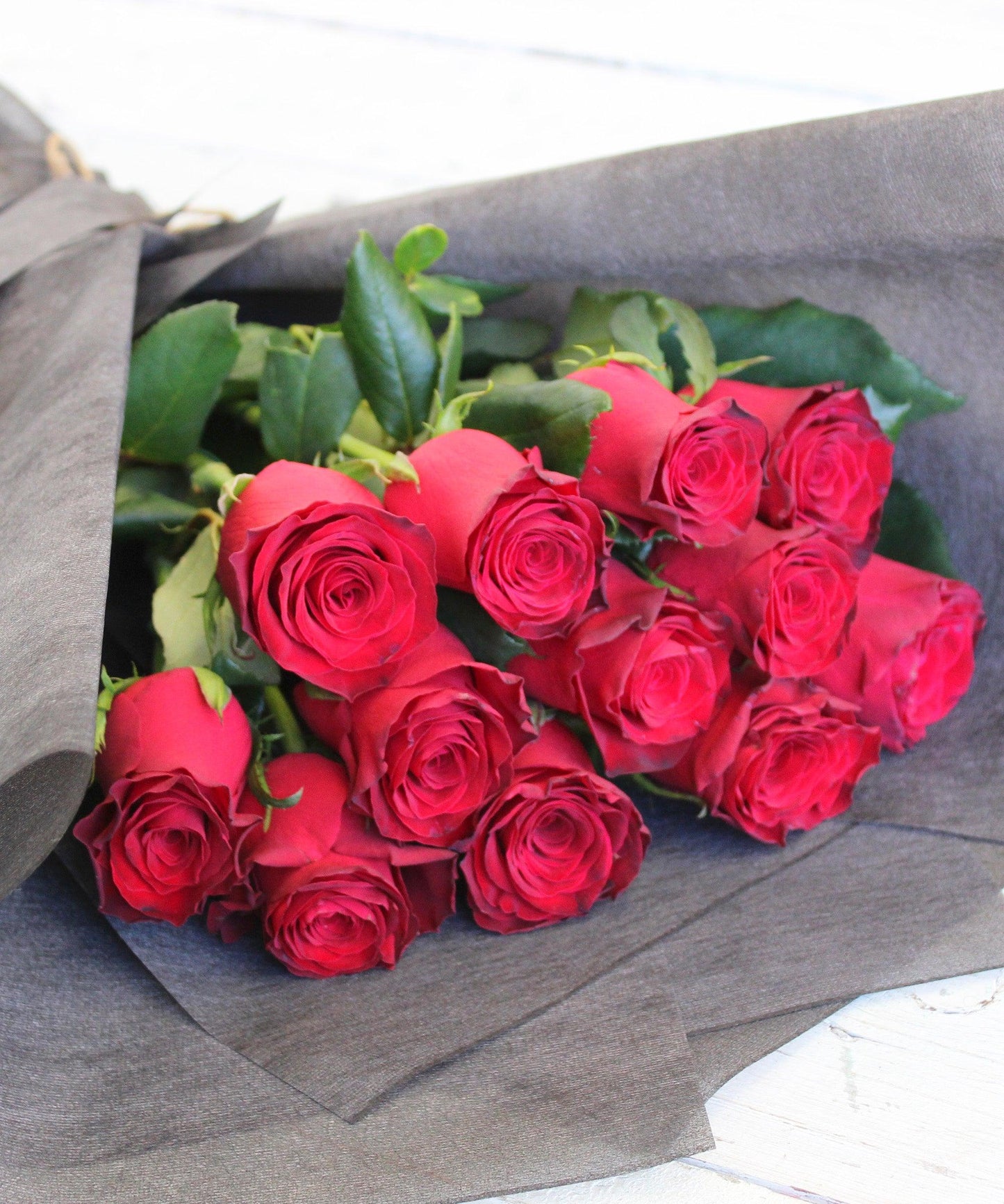 Classic-and-timeless-Red-Roses-Bouquet-Forest-and-Petals