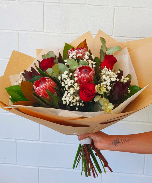 Wild-Love-Bouquet-By-Forest-and-Petals-combined-with-red-roses