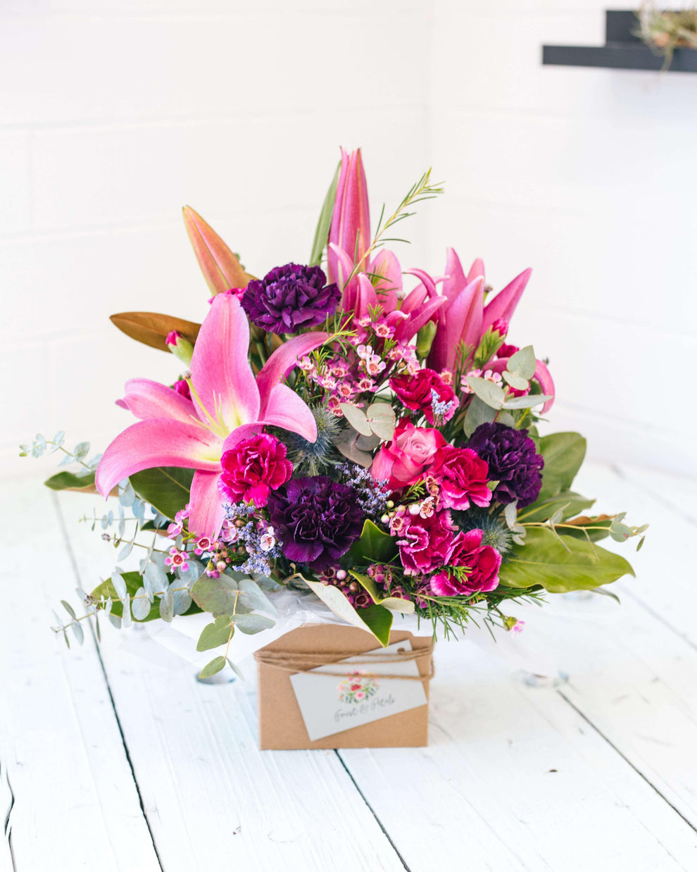 purple-rain-arrangement-forest-and-petals